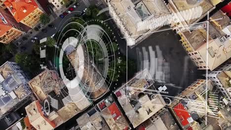 animación de círculos de carga, gráficos y flecha sobre vista aérea de la ciudad moderna