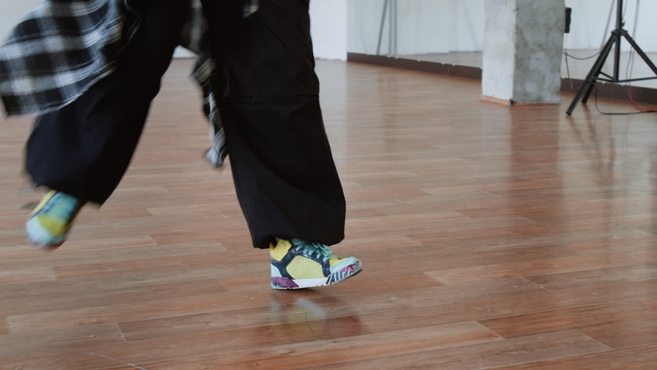 Person in motion in a dance studio