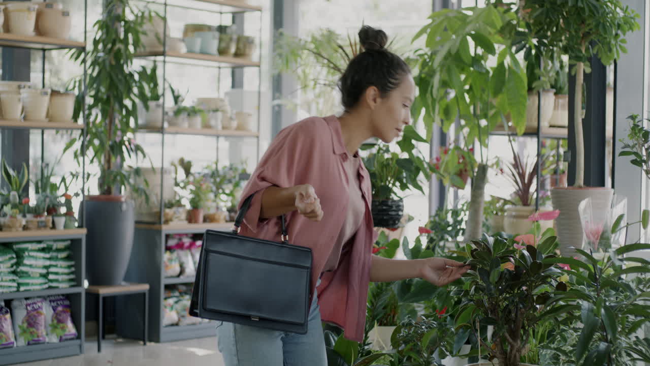 Woman Shopping for Plants in a Garden Center