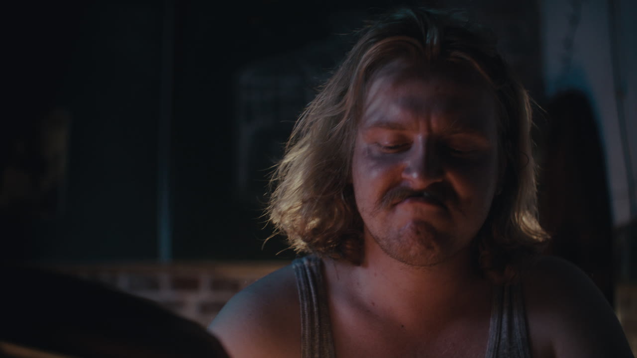 A Man Working in a Dark Room