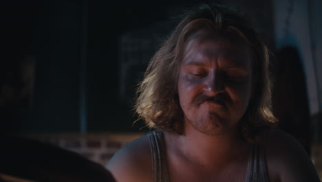 a man working in a dark room