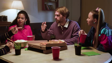 young friends talking at the party