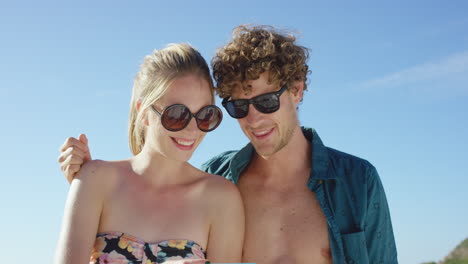 beautiful-Caucasian-couple-taking-selfies-on-the-beach