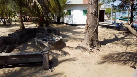 local camp fireplace with seats at riverside in kartong - the gambia