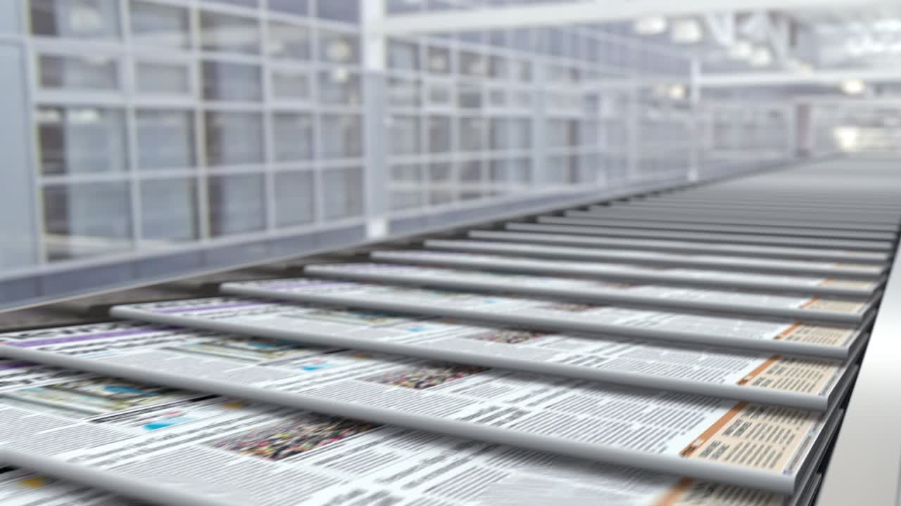 Newspaper media press on the conveyor line at the editorial office typography
