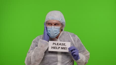 Doctor-in-PPE-suit-with-text-inscription---Please,-Help-Me-n-chroma-key,-coronavirus-pandemic