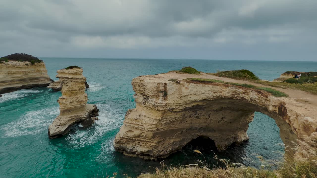 Lover's arch, Puglia. Faraglioni di Sant’Andrea with turquoise ocean before collapsing on Valentine's Day 2026