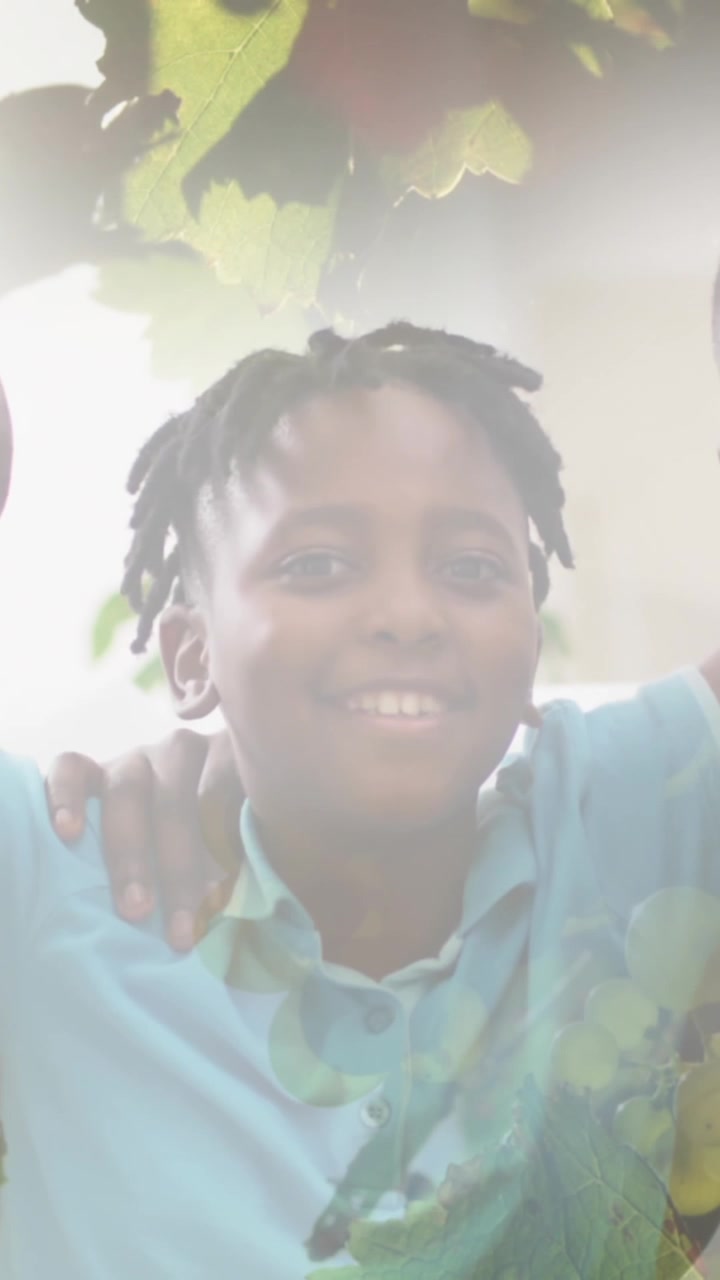 Composite of happy african american son, father and grandfather embracing, with sunlight and nature