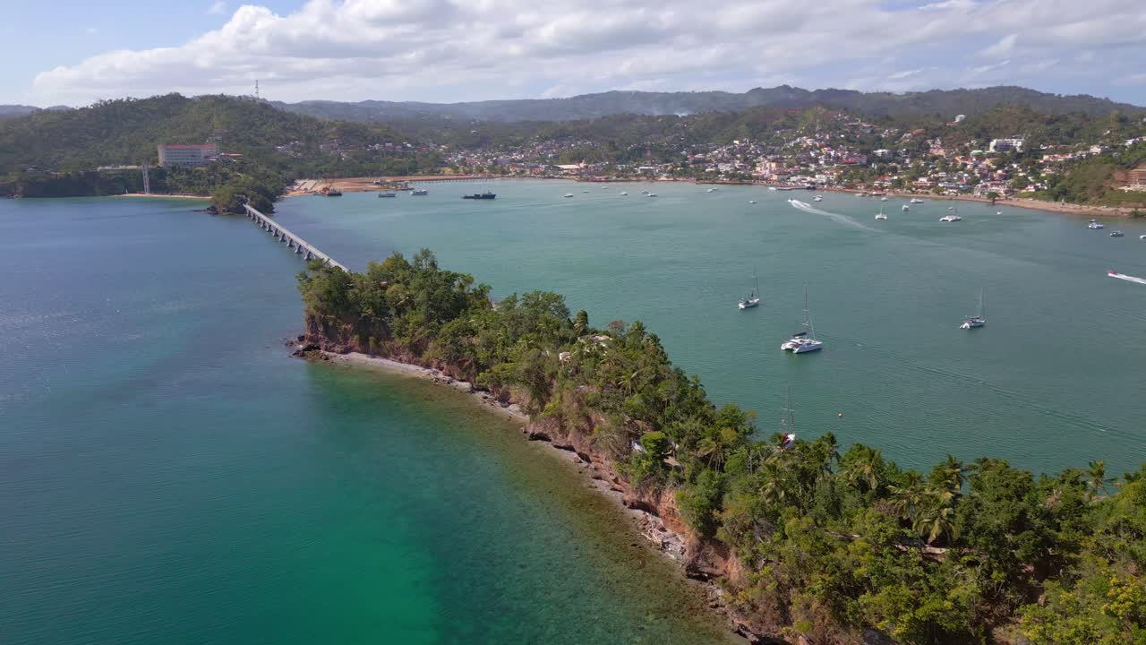 Pedestrian bridge leads to famous island Cayo Vigia in Samana, aerial orbit