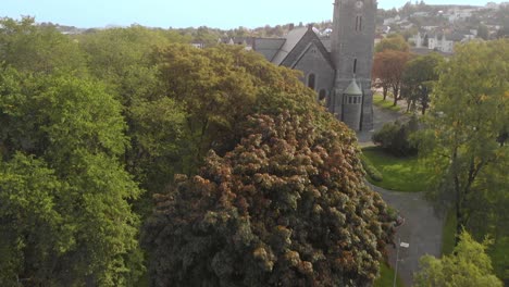 aerial look of a church by a park in trondheim