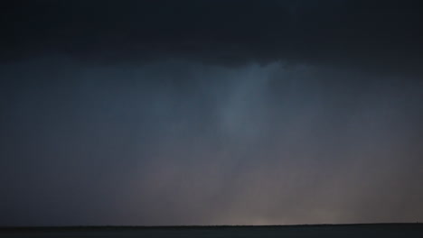 rapid lightning flashes pulse across the sky in night storm footage