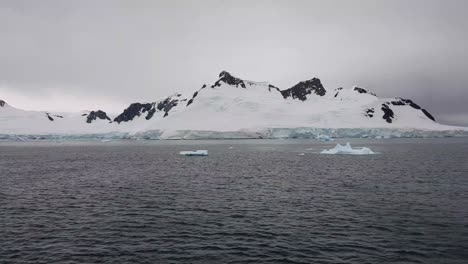 underwater view of iceberg with beautiful transparent sea on background underwater view of iceberg with beautiful transparent sea on background