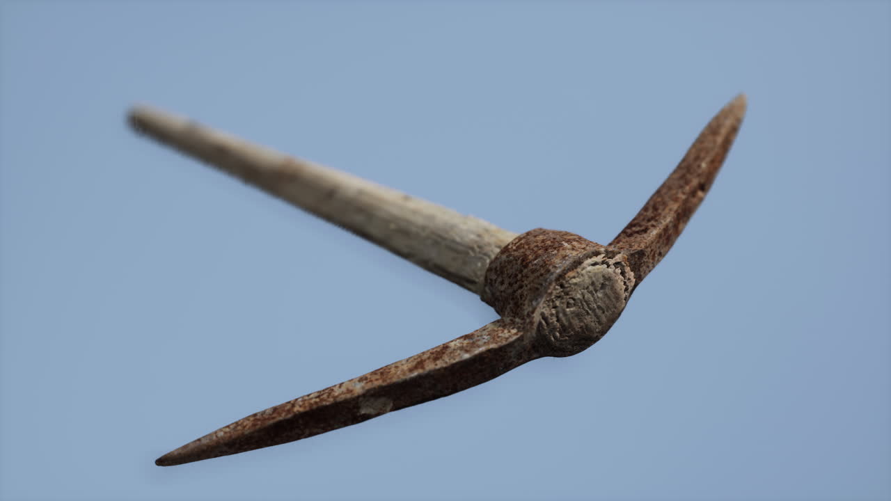 Close up of an old rusted pickaxe head