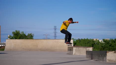 man does a grind on the skateboard ledge