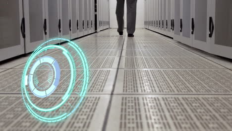 animation of processing circle over person walking in server room