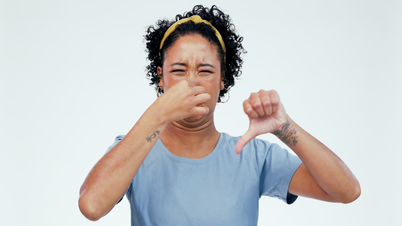 Bad smell, woman face and nose pinch in studio