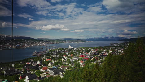 panoramic view of tromso, norway from a high viewpoint.
high view of the nordic city, the landscape and the beautiful norwegian fjords.