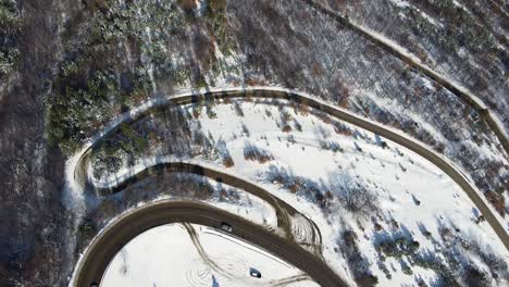 top-down aerial view, panning from the "vasil levski" memorial to the balkan mountains and the village of bunovo, bulgaria