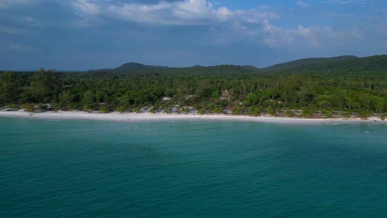 Santa claus is enjoying summer holidays on a beautiful tropical beach. Unique aerial view flight speed ramp hyper motion time lapse