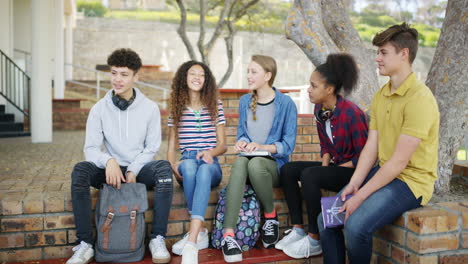 a group of teenage students hanging out during