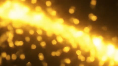 golden lights twinkle and dance in the evening air, creating a warm and inviting ambiance. the enchanting display captivates viewers with its brilliance and magic as night falls.