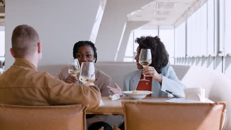 friends celebrating lunch in a restaurant