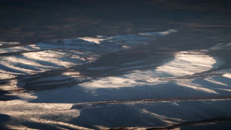 snowy mountain peaks aerial view