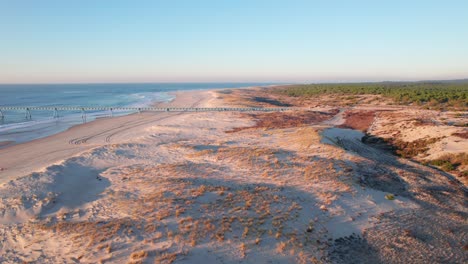 Panorama-Of-The-Jetty-With-Vast-White-Sand-At-The-Seashore-On-The-Backdrop