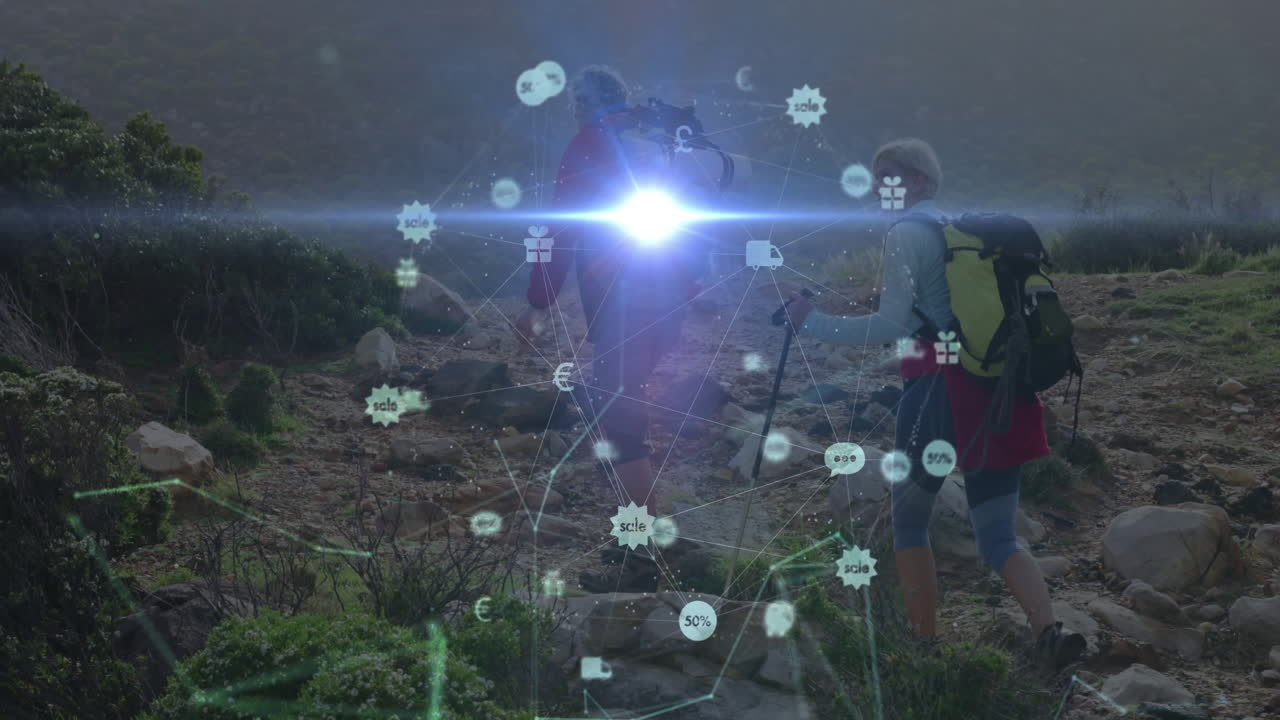 couple hiking along mountain trail, showing currency and gift icons overlaying rocky landscape