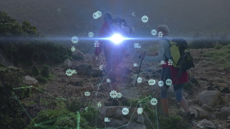 couple hiking along mountain trail, showing currency and gift icons overlaying rocky landscape