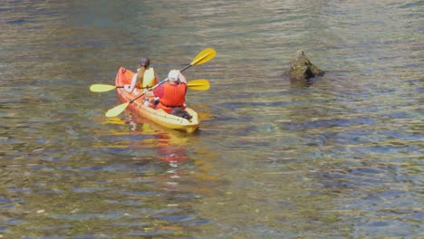 croatia, dubrovnik - two people canoeing