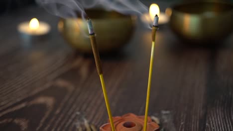 incense with tibetan bowls and candles