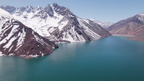 Panorama-Of-El-Yeso-Reservoir-And-Snowy-Andes-Mountain-Range-In-Santiago,-Chile