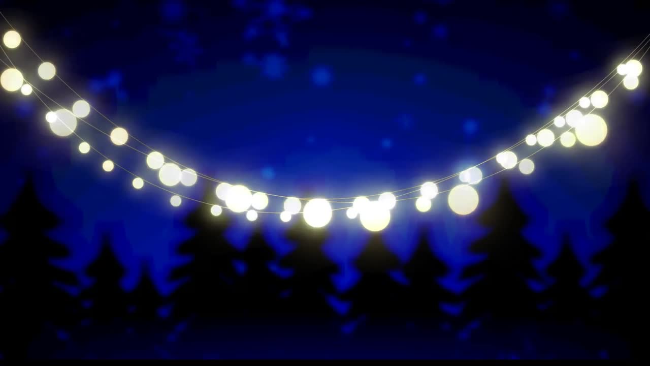 Animation of glowing fairy lights over winter landscape
