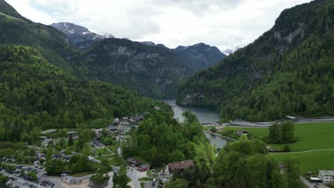 Aerial-view-of-the-village-Schönau-am-Königssee-and-picturesque-lake-Königssee-near-the-town-of-Berchtesgaden-in-the-Bavarian-Alps-in-Germany