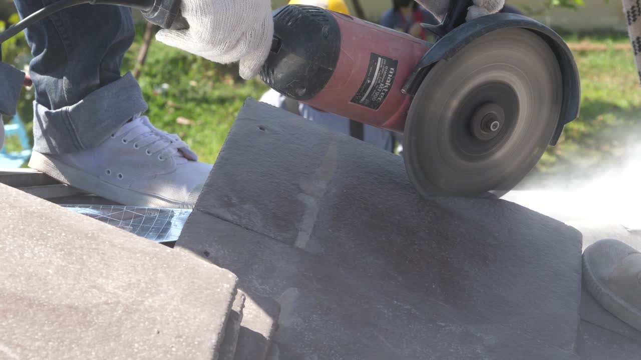 Asian Worker Doing Roof Tiles Installation, Cutting, Measuring Process, Close Up