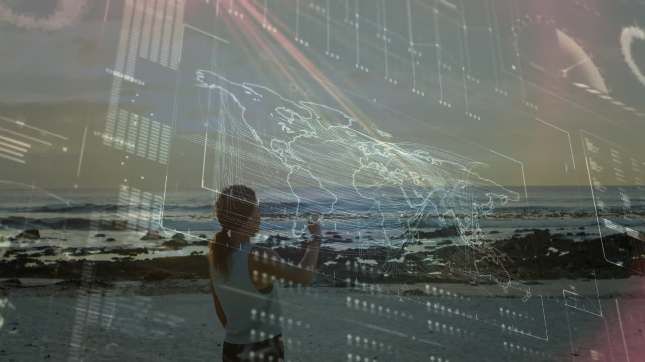 Person on beach with digital world map and data overlay animation