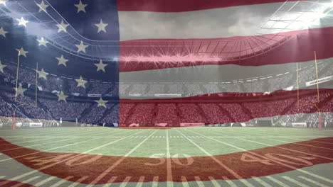 american flag waving in a full stadium background