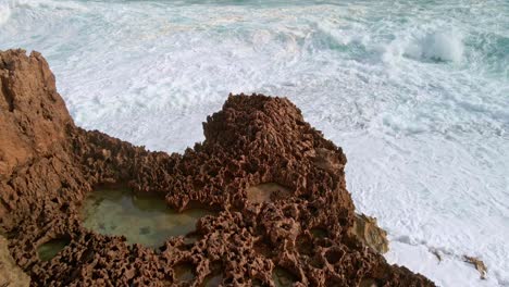 Aerial-view-of-rock-formation-and-ocean-waves-along-Elliston-coastal-trail,-Eyre-Peninsula,-South-Australia