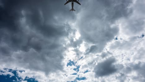 close-up 4k time lapse video of white big clouds on a blue sunny sky. summer blue cloudy sky time lapse. effect of flying an airplane through the clouds, video loop