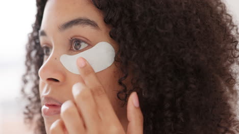 black woman, face and skincare eye patch