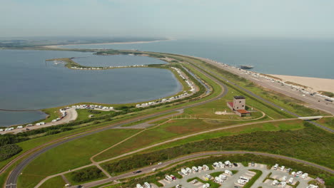 aerial of grevelingenmeer river and brouwersdam strand beach in zeeland, netherlands