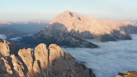 breathtaking aerial view of cloud inversion in valley of italian dolomites