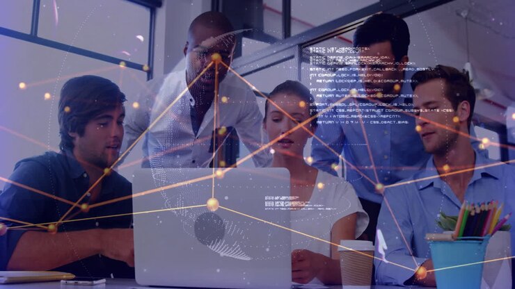 Animation of network of connections over diverse business people using laptop in office