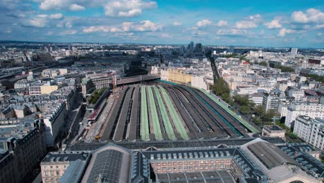 Aerial-view-of-Paris-Gare-du-Nord-railway-station,-France,-forward,-day