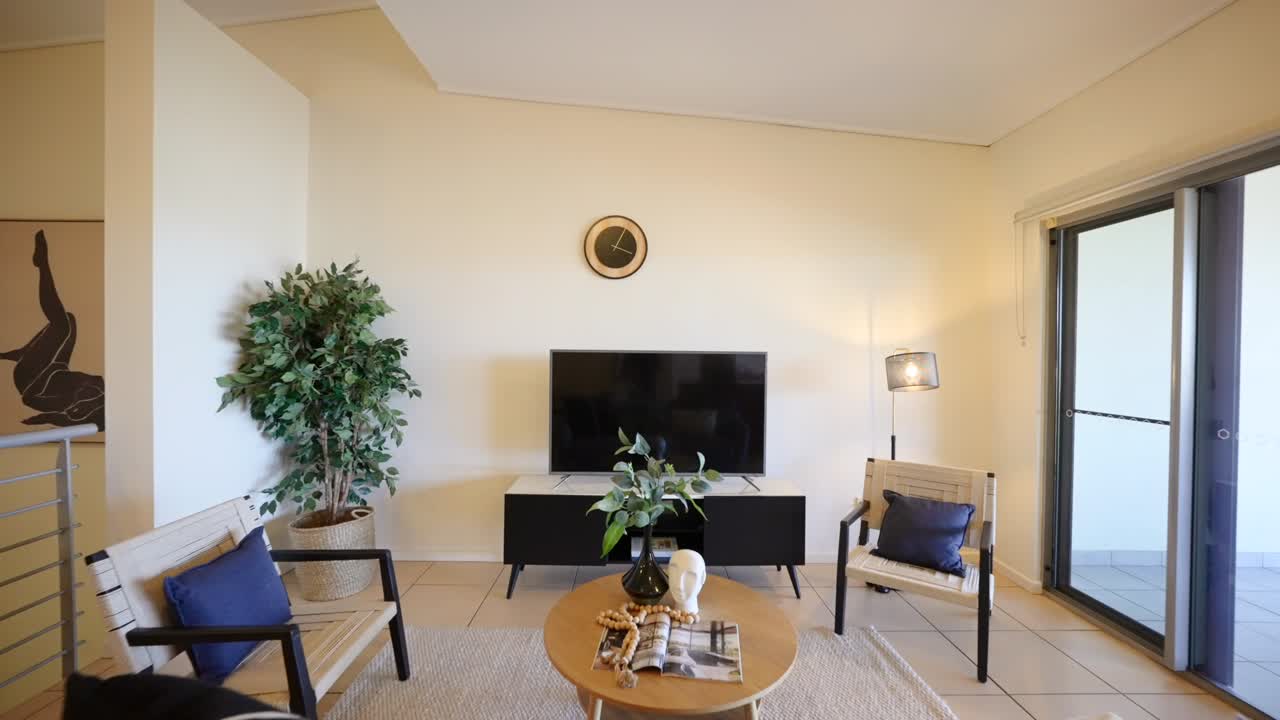 Minimalist loungeroom interior in a lofi style modern home, featuring sleek furniture and natural lighting. Interior of house home staged for real estate.