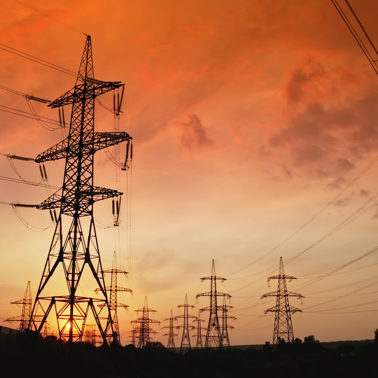 Transmission electricity steel pylon tower. View of high voltage power pylons
