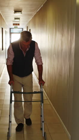 patient walking with zimmer frame