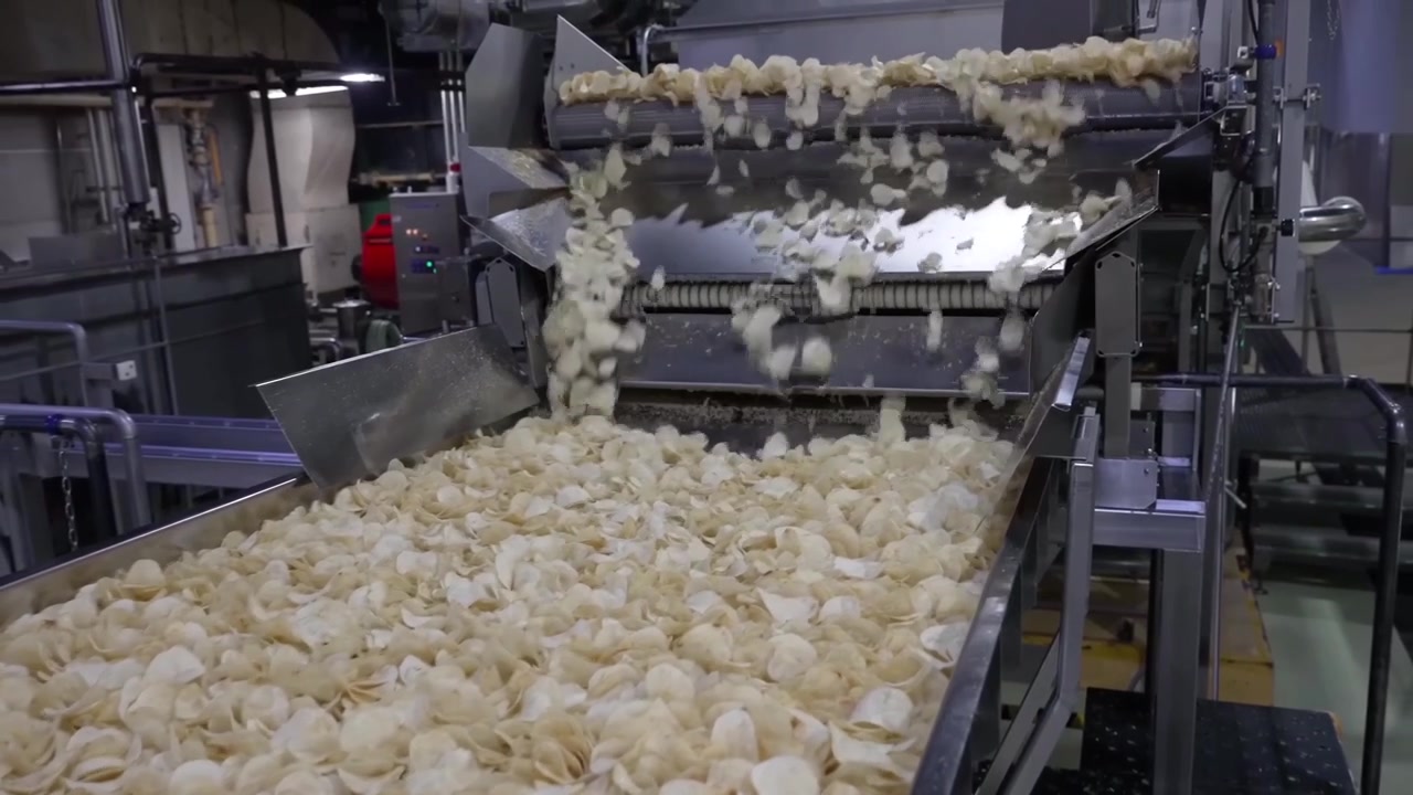 Chips are fried and poured into the packaging process