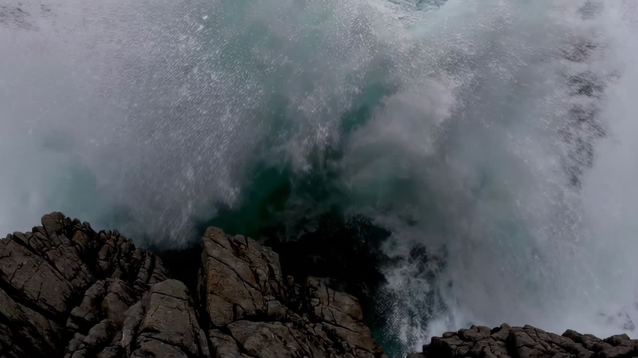 Powerful Waves Crashing on Rocky Coastline